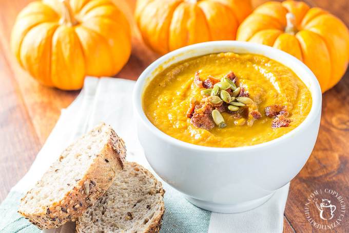 This recipe for pumpkin soup made in the slow cooker is easy, zesty, and bursting with the taste of autumn! Prep in the morning & have an effortless dinner! #pumpkin