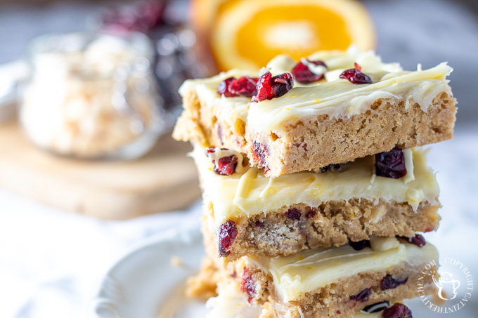 Whether you've tried this treat at a certain coffee shop or not, you're sure to love the creamy, citrusy winter goodness of these cranberry bliss bars!