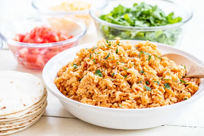 This homemade Spanish rice is as easy as the boxed rice you buy at the store, more flavorful, and healthier. This is the perfect side to your taco nights.