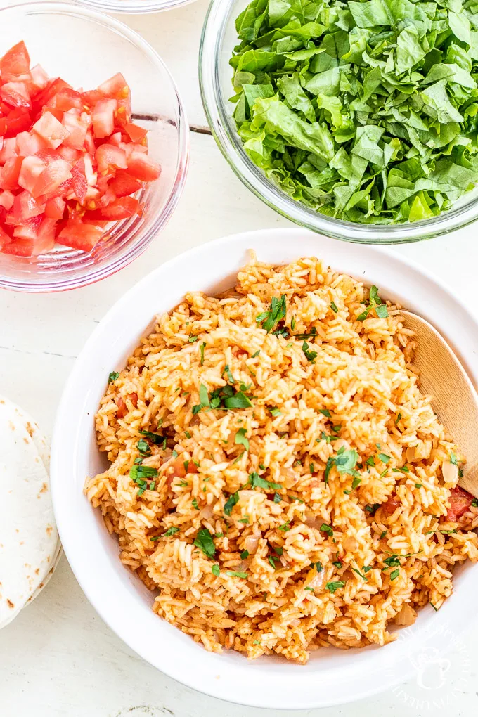 This homemade Spanish rice is as easy as the boxed rice you buy at the store, more flavorful, and healthier. This is the perfect side to your taco nights.