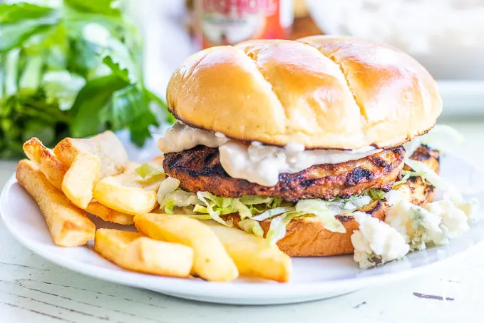 These tangy, tasty buffalo chicken burgers are a serious taste explosion – just make sure you’ve got enough blue cheese mayo to go around!