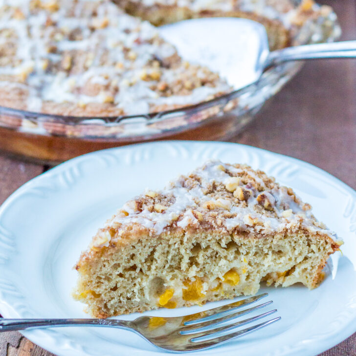 Warm, homey, and just a little bit indulgent, this Country Peach Coffee Cake is an easy to make treat in and out of peach season!