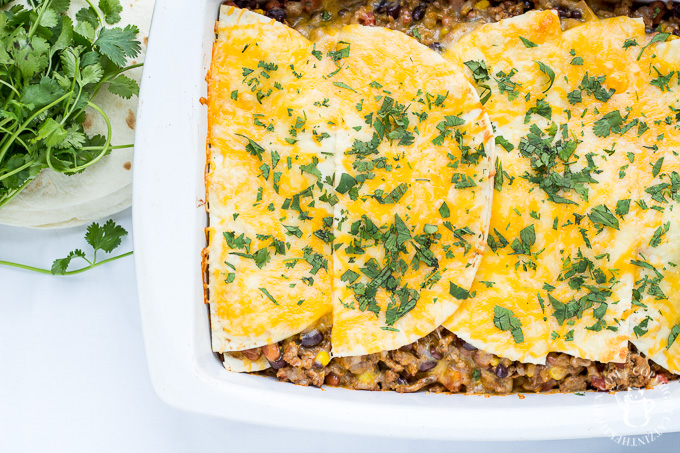 This delicious family favorite Mexican Lasagna recipe is made mostly from ingredients we always have in the pantry and it comes together in just 30 minutes!
