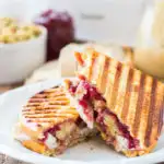 Have some Thanksgiving leftovers in the fridge? Turn them into a delicious lunch or dinner in 15 minutes with this Thanksgiving Leftover Panini recipe!