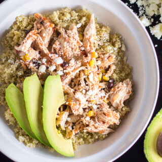 This recipe for a Simple & Healthy Chicken Fiesta Quinoa Bowl is quick, easy, and comes together in the slow cooker! You can't beat that. Add a little avocado and queso fresco and you've got a tasty dinner.