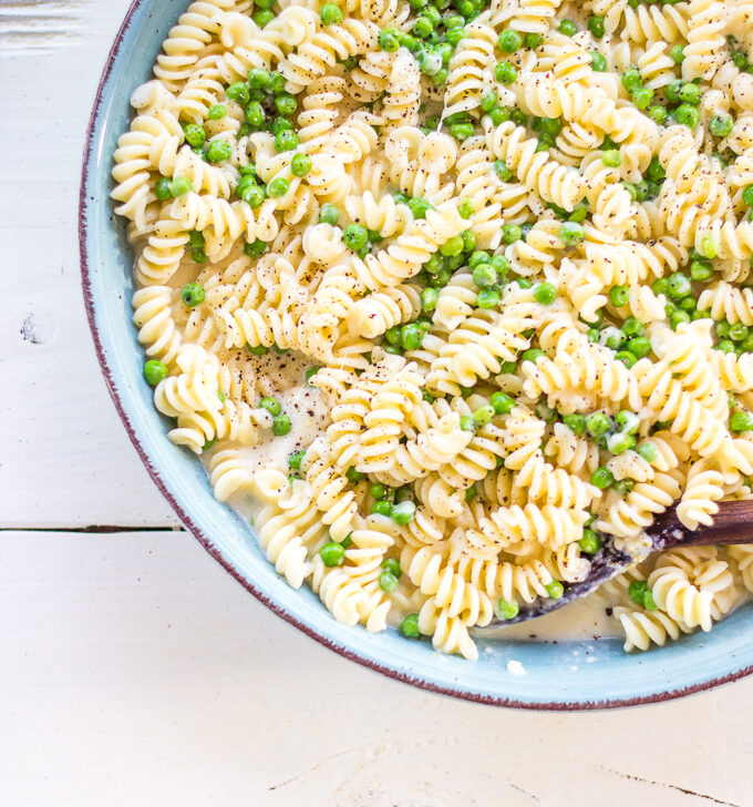 This Lemon and Pea Alfredo is a Italian summer pasta dream come true! Bright, fresh, nutty, creamy, and tangy, it's flavor-forward in the best possible way.