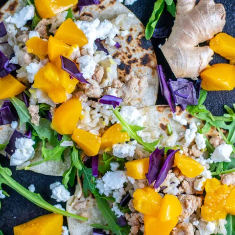 These pork and peach street tacos are a bright, light fusion blend of flavors and ingredients in a recipe that is healthy, quick, and, actually, beautiful!