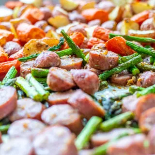 This recipe for one pan chicken sausage with roasted asparagus and potatoes is easy, healthy, kid-friendly, and can be prepared a bit ahead of time!