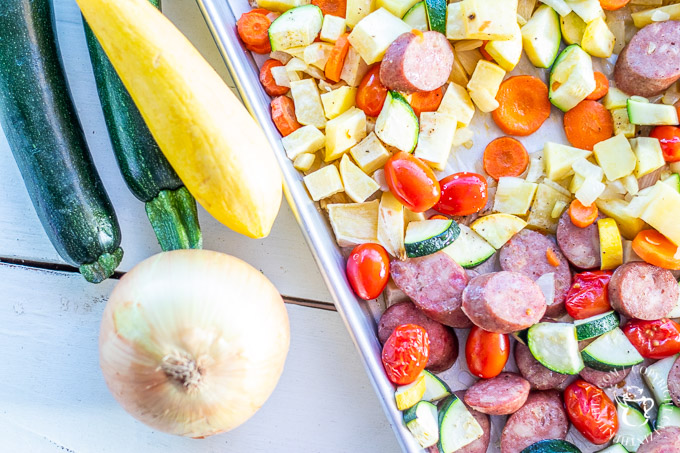 This one pan sausage dinner recipe includes lots of bright, flavorful, and healthy summer vegetables, and it's easy to prepare - just chop those veggies!
