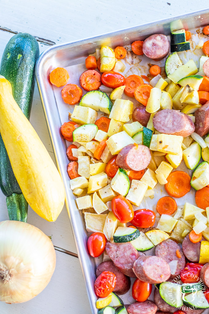 This one pan sausage dinner recipe includes lots of bright, flavorful, and healthy summer vegetables, and it's easy to prepare - just chop those veggies!