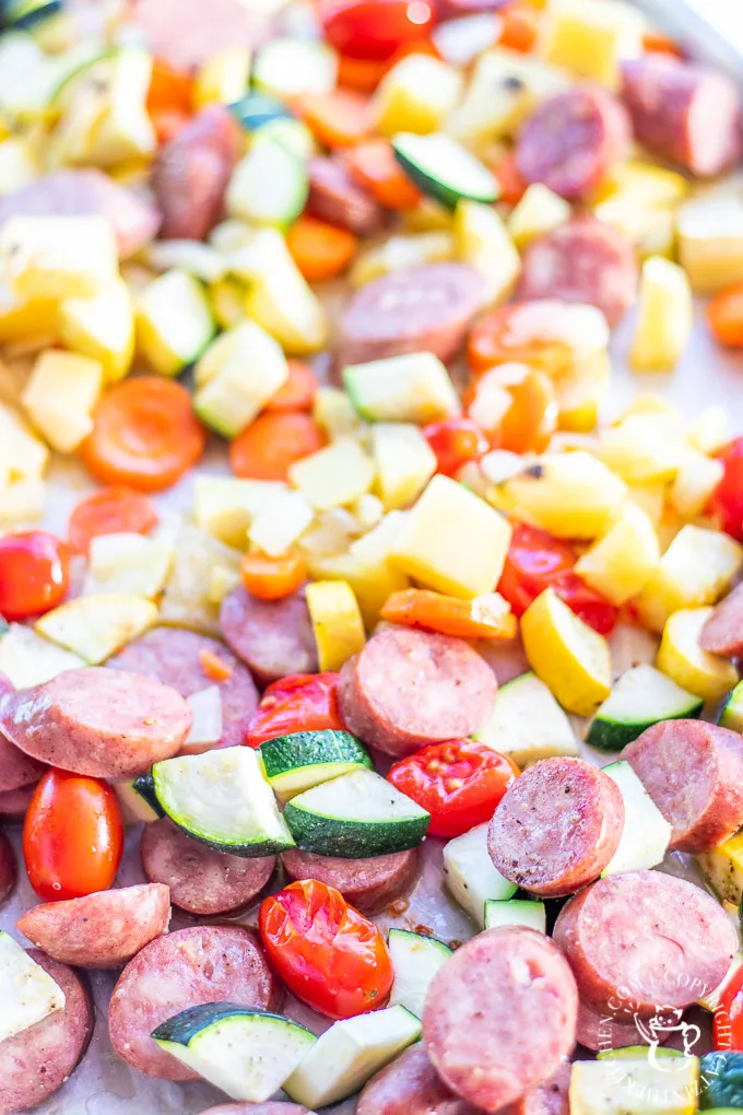 This one pan sausage dinner recipe includes lots of bright, flavorful, and healthy summer vegetables, and it's easy to prepare - just chop those veggies!