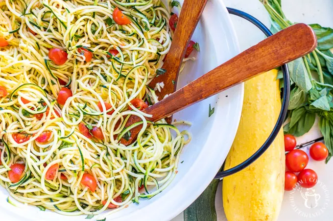 A late summer salad that is simple, healthy, colorful, and easy to make for crowds? That's where this summer squash caprese salad comes in!