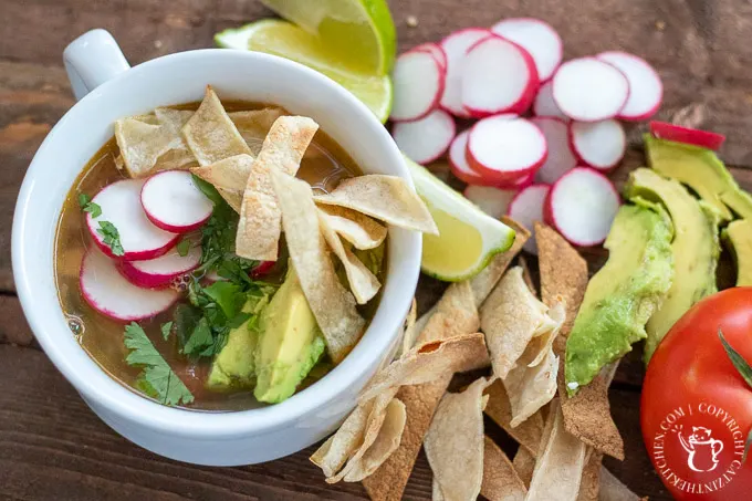 This comforting, brothy take on tex mex chicken tortilla soup is easy to make in a hurry, and features simple, staple ingredients and easy directions!