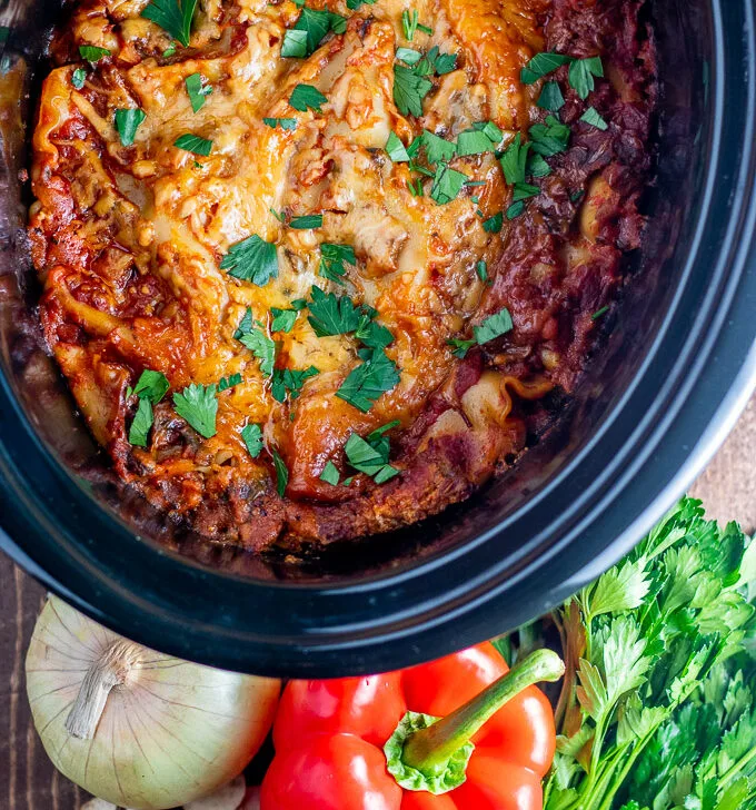 This easy recipe for slow cooker veggie lasagna is one of those crazy-day busy-parent end-of-day lifesaver kind of meals! Plus...leftovers!