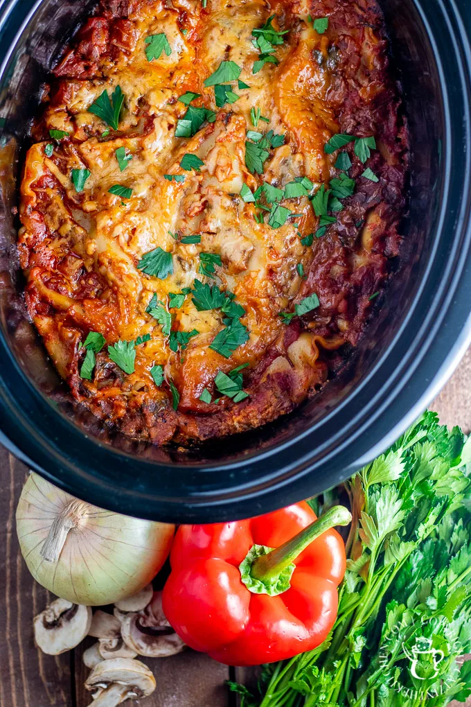 This easy recipe for slow cooker veggie lasagna is one of those crazy-day busy-parent end-of-day lifesaver kind of meals! Plus...leftovers!