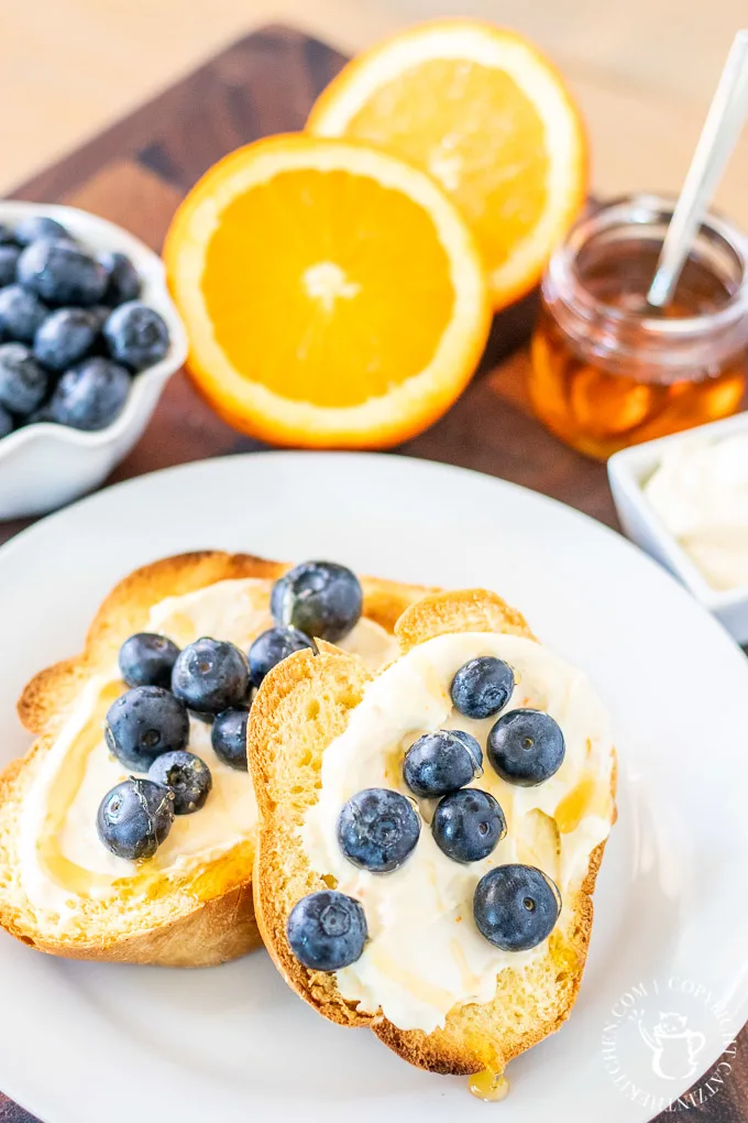 This simple brunch recipe for Orange and Mascarpone Toast with blueberries and honey puts delightful breakfast food on the table in about five minutes!