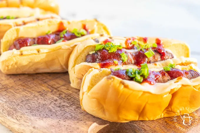 This is so easy, it's barely even a recipe! Instead of plain ole' hotdogs, why not punch it up with some bacon wrapped cheese dogs? 