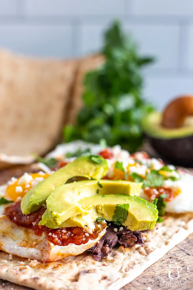 Flatbread Huevos Rancheros with avocado