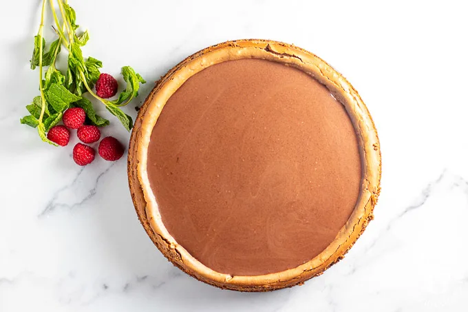 Chocolate Cheesecake with raspberries and mint 