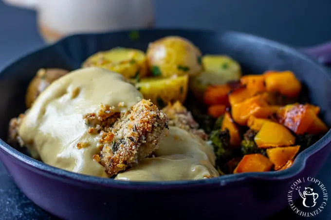 Baked Parmesan Rosemary Chicken Thighs with Honey Mustard Sauce in a skillet 