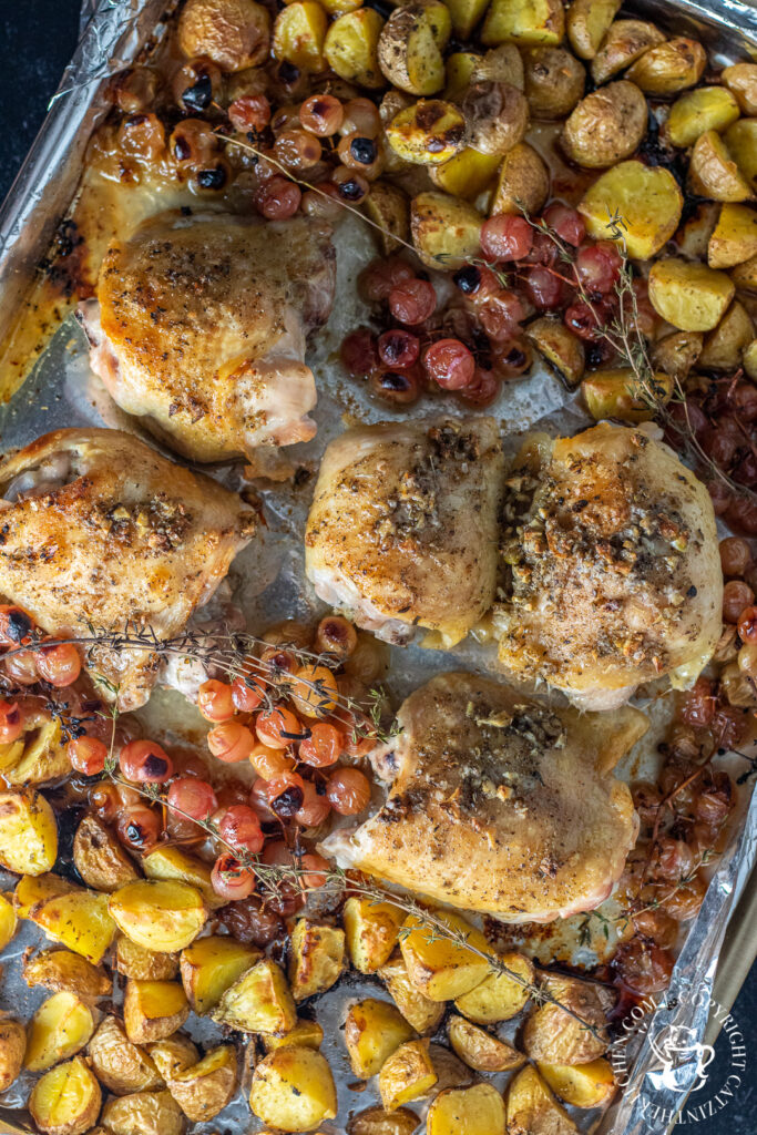 One Pan Chicken with Grapes ingredients on sheet pan 