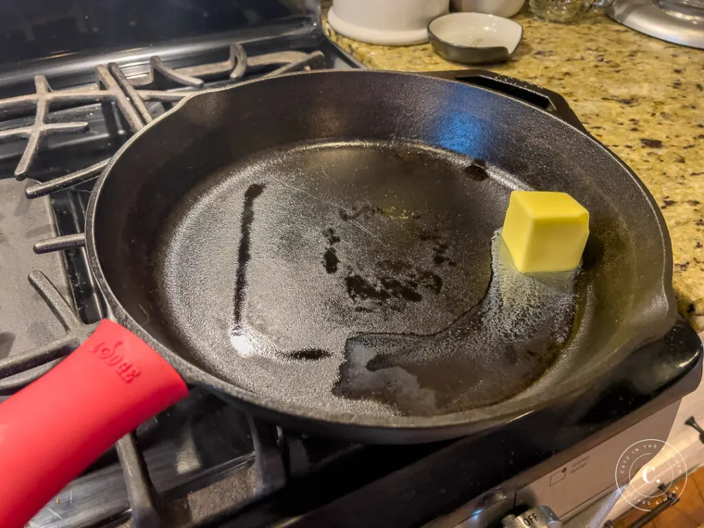 butter melting in cast iron skillet 