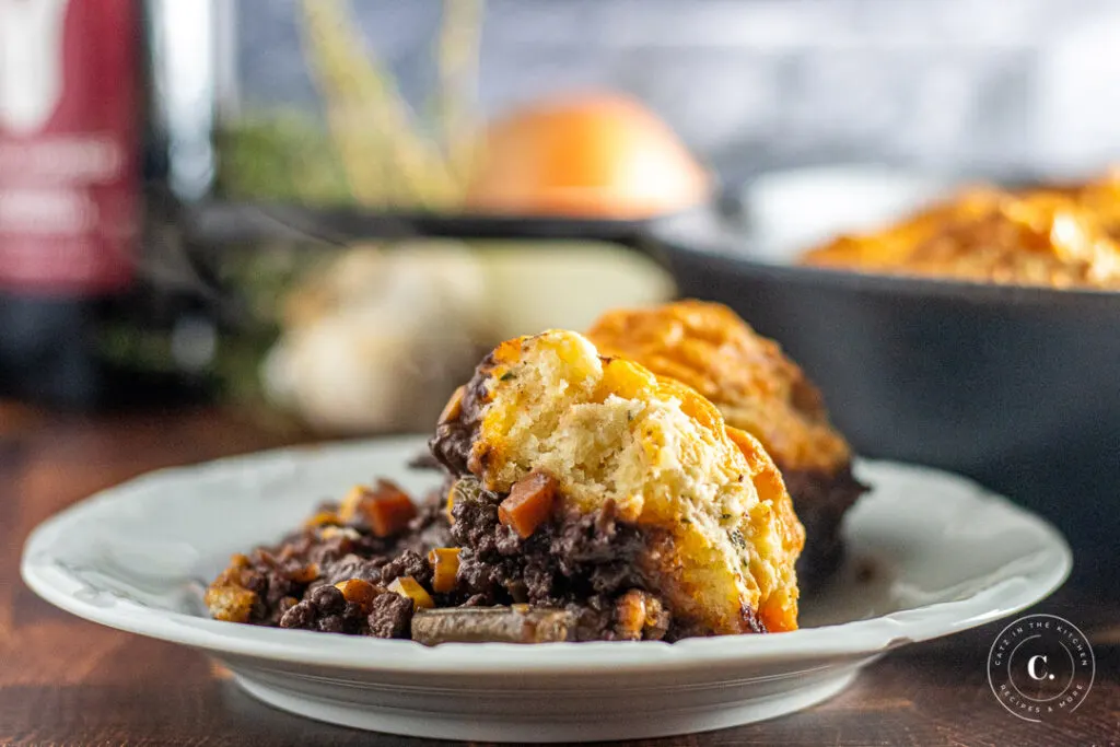 beef stew topped with biscuits 