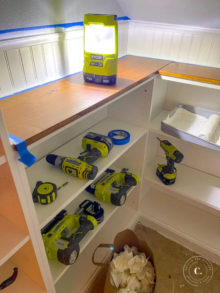 caulking bead board wainscoting in pantry 