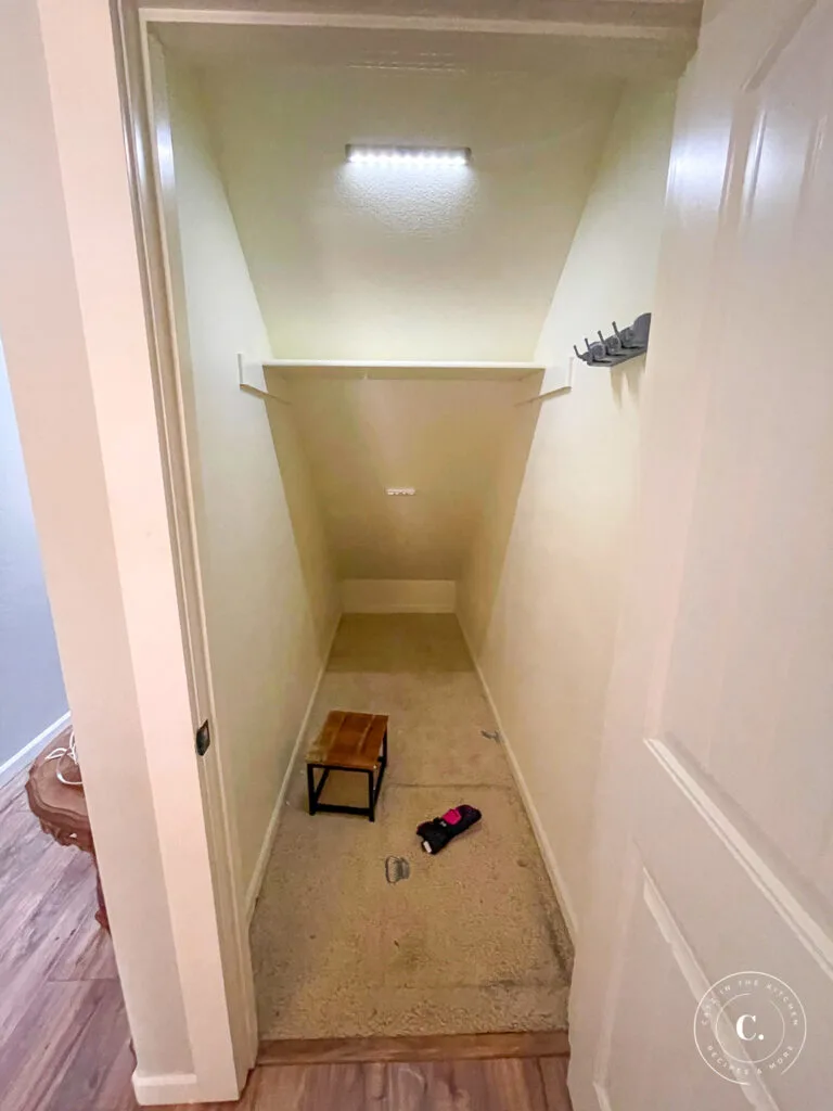 Under the stairs coat closet 