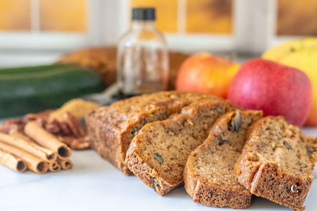 Apple Zucchini Bread loaf with ingredients 