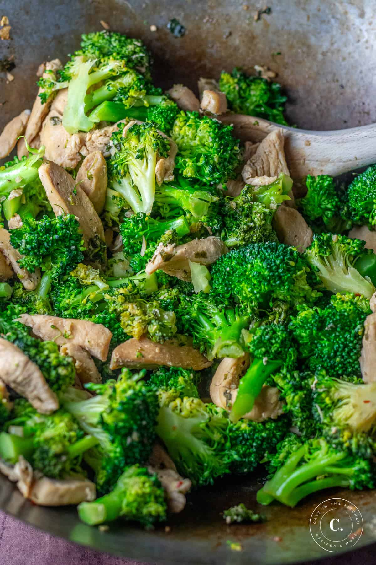 broccoli and chicken stir-fry in wok